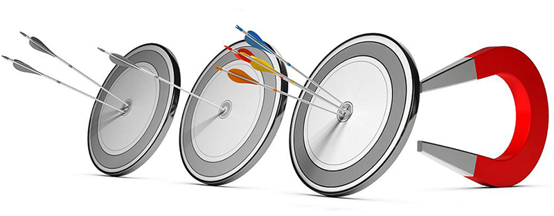 Three targets with many colorfull arrows hitting the first one with a horseshoe magnet at the background. Concept image suitable for marketing purpose and winning new customers illustration.
